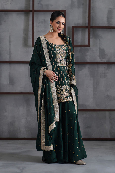 Green embroidred kurti, booti sharara and dupatta