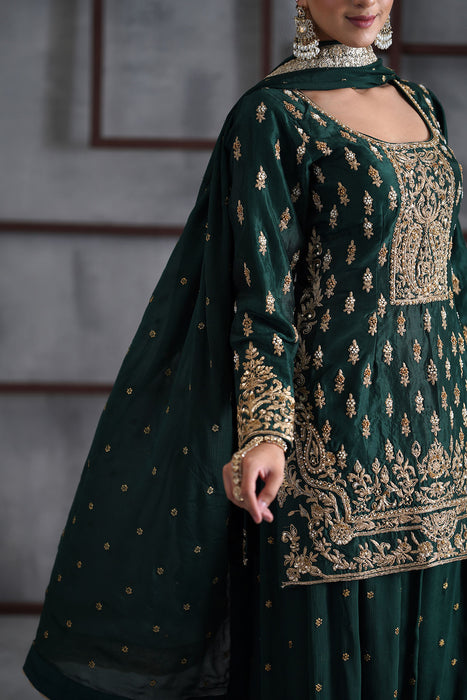 Green embroidred kurti, booti sharara and dupatta