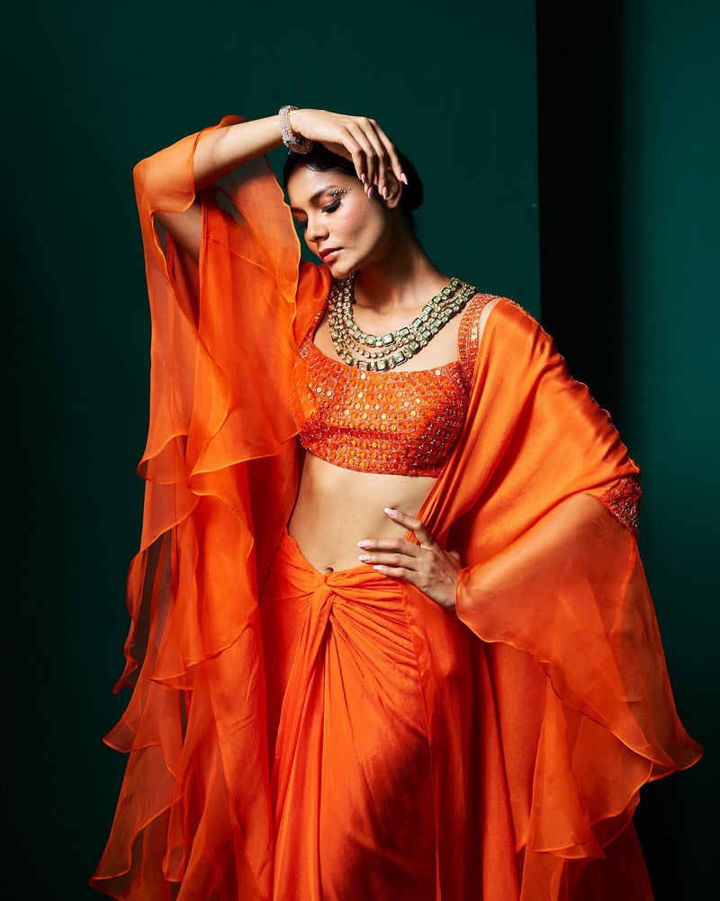 Zoha drape skirt set with ruffle
cape - persimmon Orange